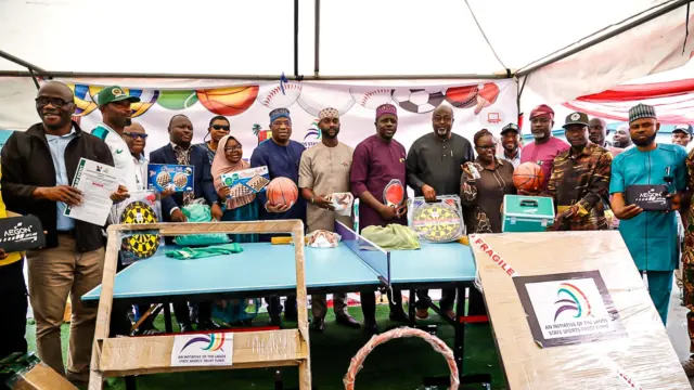 LSSTF Chairman, Wahid Enitan Oshodi (seventh left), Lagos State Commissioner for Youth and Social Development, Mobolaji Ogunlende (middle), members of the LSSTF and government officials at the distribution of the equipment to 57 councils in Lagos, yesterday.