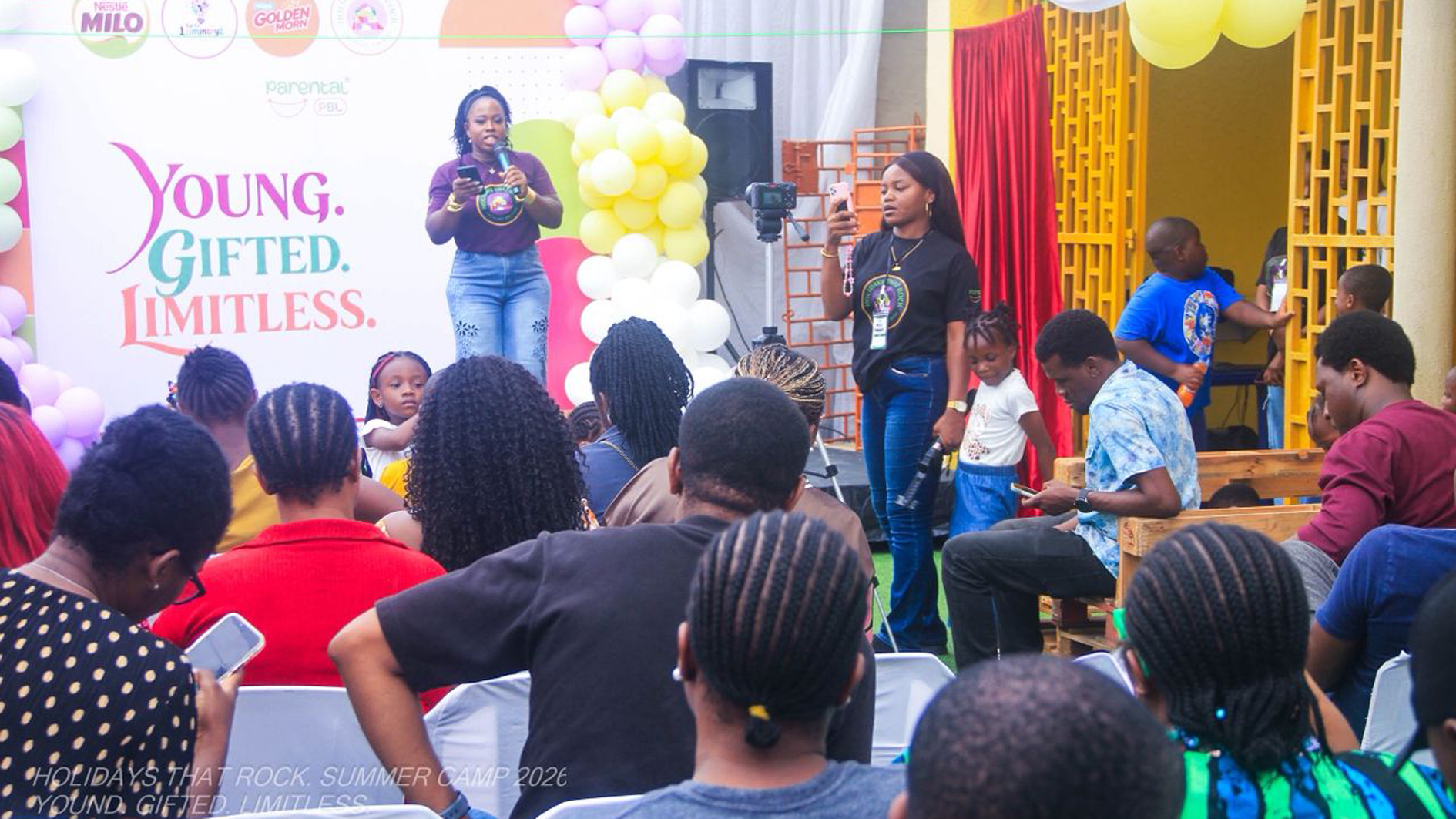 Camp Director, Idara Uwatt addressing the crowd of children and some parents at the camp grounds.