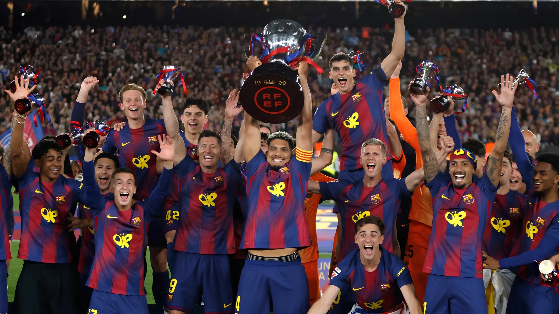 Barcelona players celebrate their title win.