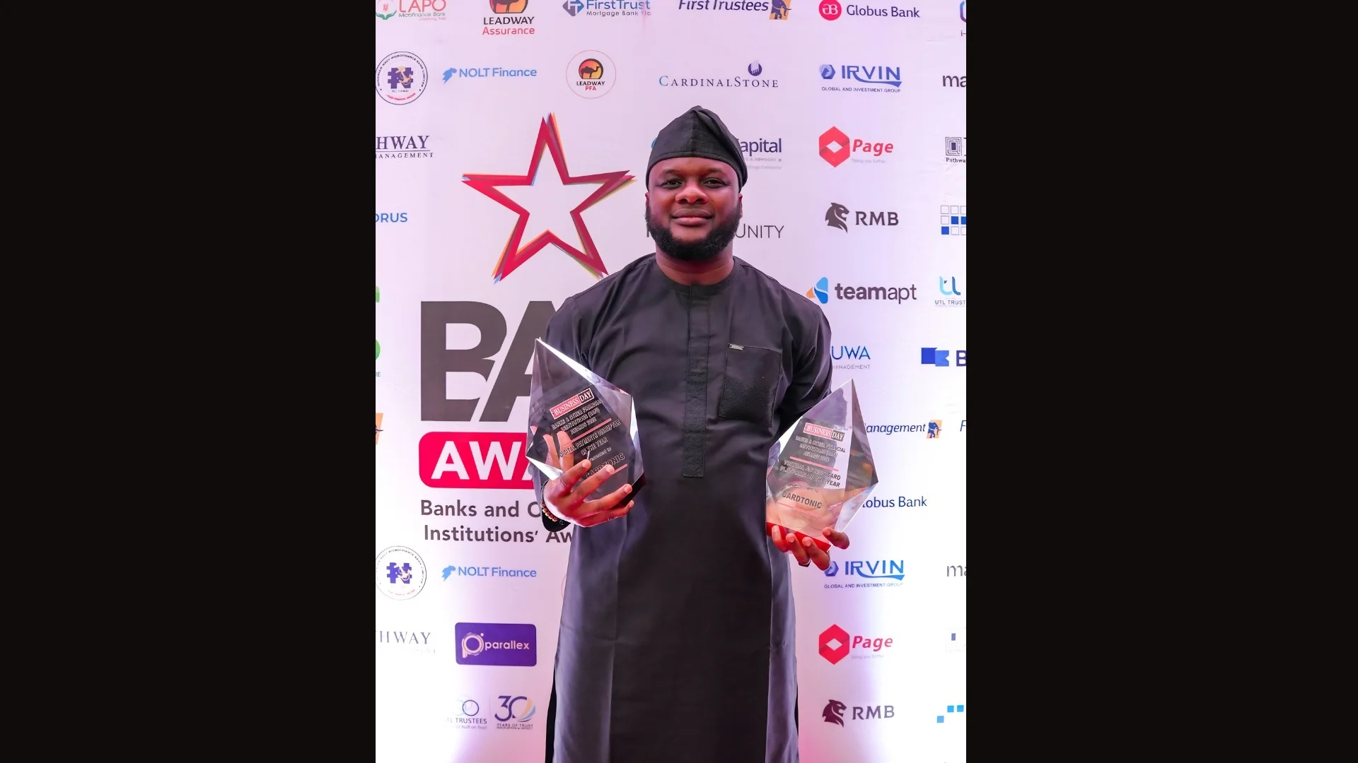 Executive Officer, Sohe, with the two awards at the 14th edition of the BAFI awards.