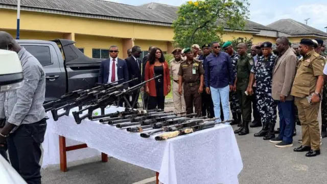 Deputy Governor, Rt. Hon. Peter Odey during parade of the suspects and display of the weapons