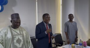 Pastor David Olaosebikan of the Redeemed Christian Church (Right), CEO New Horizons Systems Solutions, Mr Tim Akano (Middle) Director Business, Finance & Human Development of Al-Habibiyya Islamic Centre, Abuja, Malam Idris Ibrahim (Left) at induction & orientation programme for Cohort 3 of  IDEAS-TVET  training in Hardware and Phone Repair in Abuja