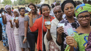 NIgerian-Voters-display-their-PVCs-prior-to-voting