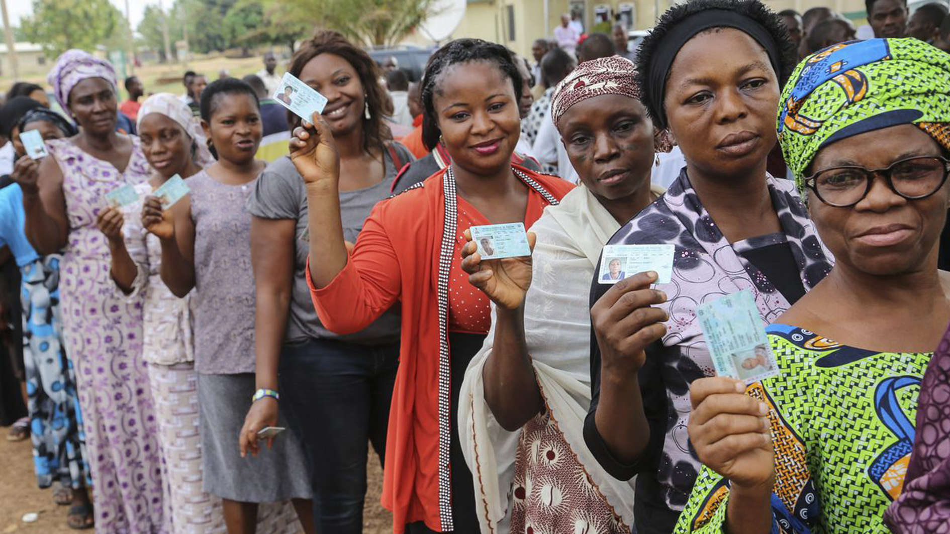 NIgerian-Voters-display-their-PVCs-prior-to-voting