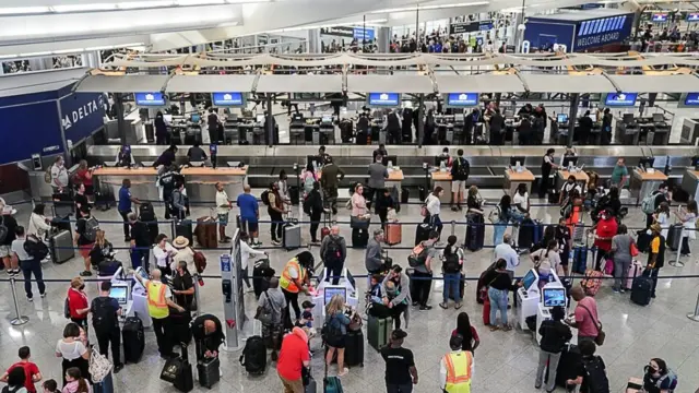Air travellers at an airport.