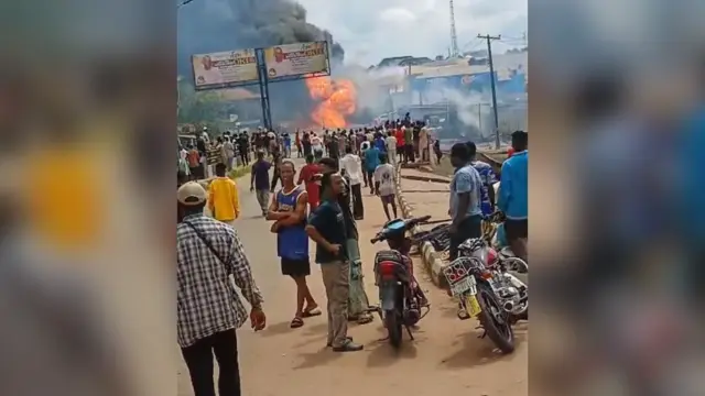 Burning tanker along the Old Lagos–Asaba Road, yesterday.