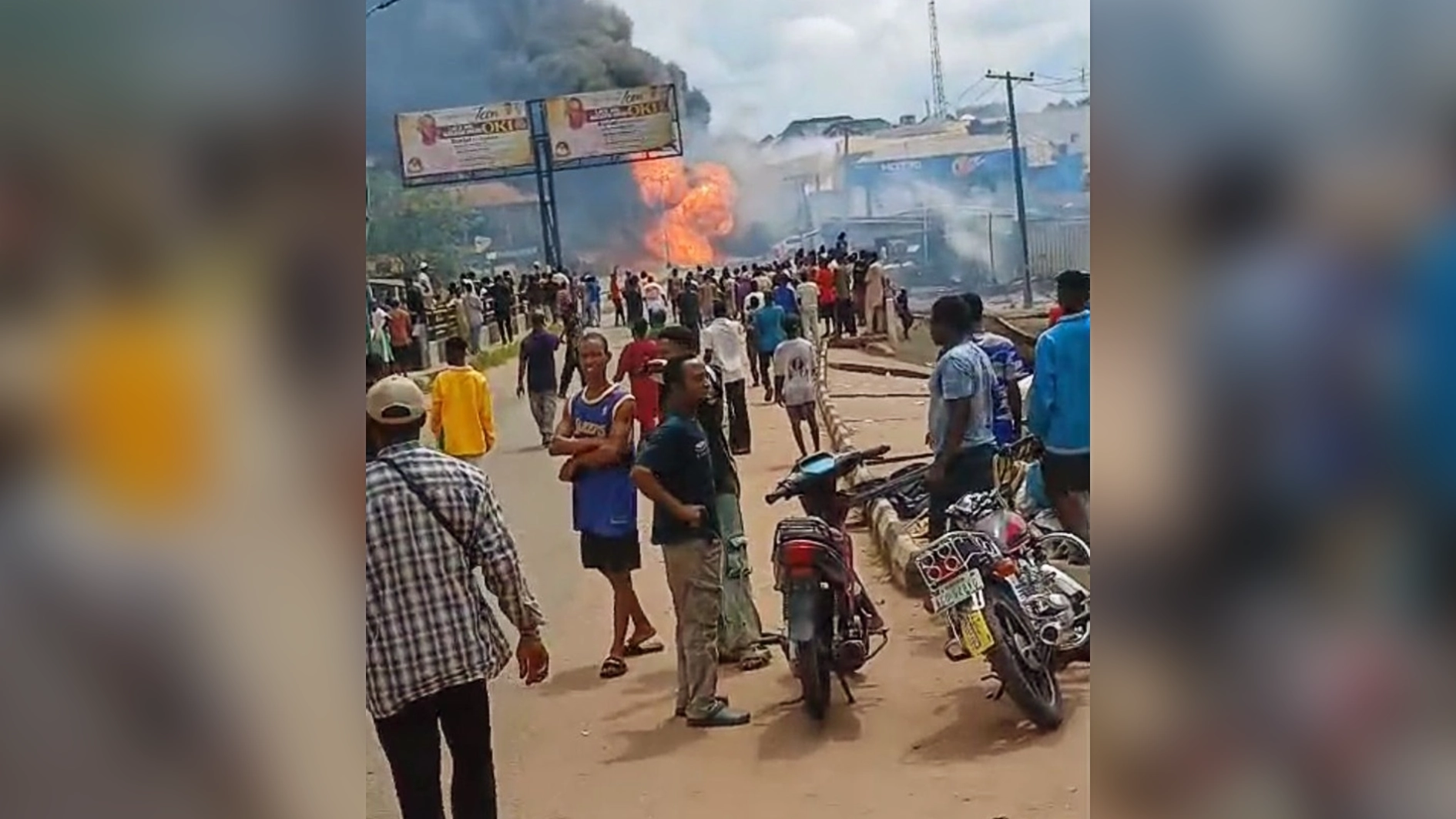 Burning tanker along the Old Lagos–Asaba Road, yesterday.