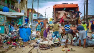 LAWMA officials clearing waste in Oshodi, yesterday.