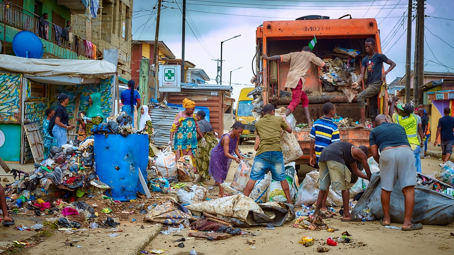 LAWMA officials clearing waste in Oshodi, yesterday.