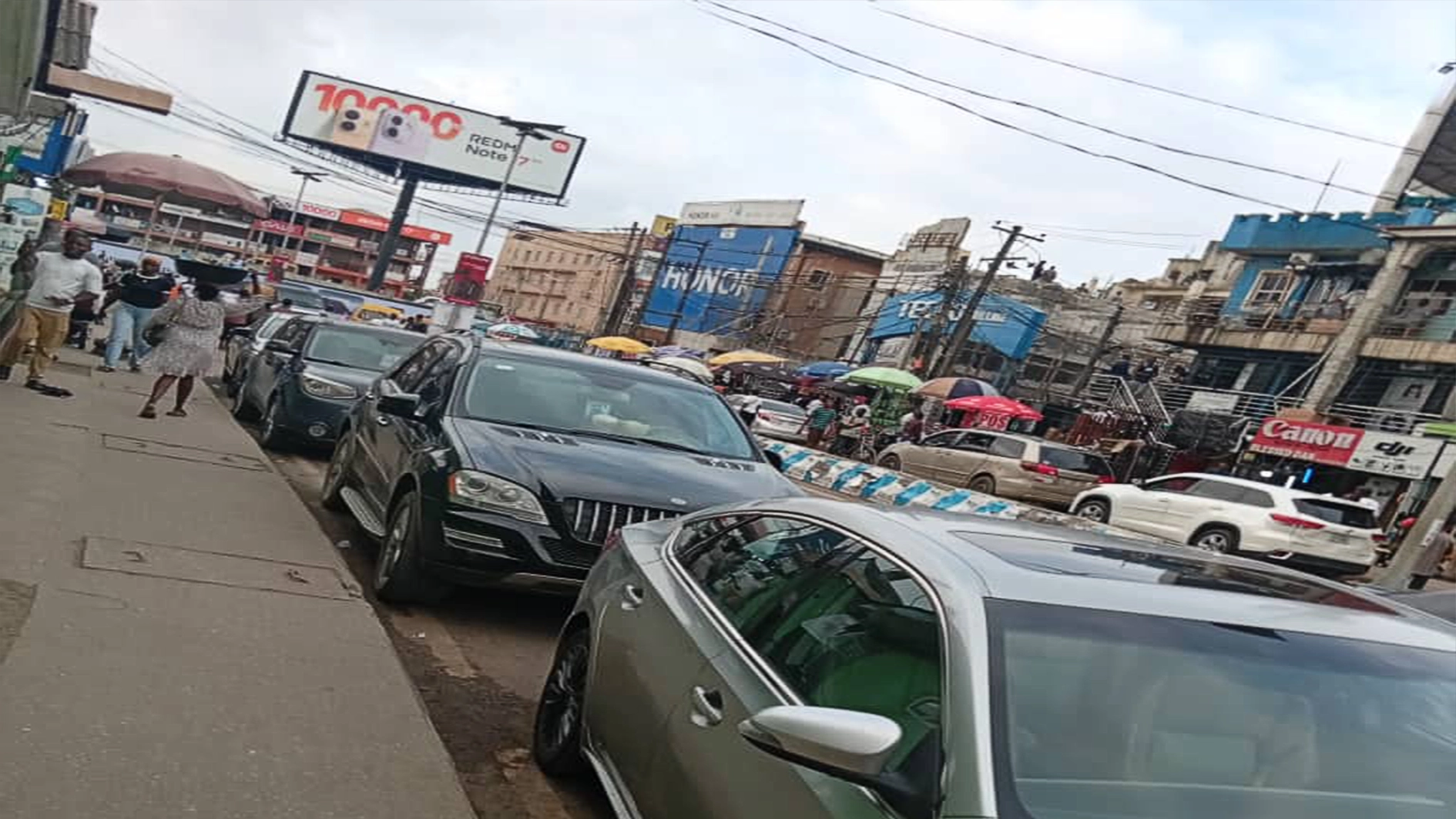Parked vehicles occupying sections of Awolowo Road, Ikeja..yesterday. 					        PHOTO: GLORY SUNDAY