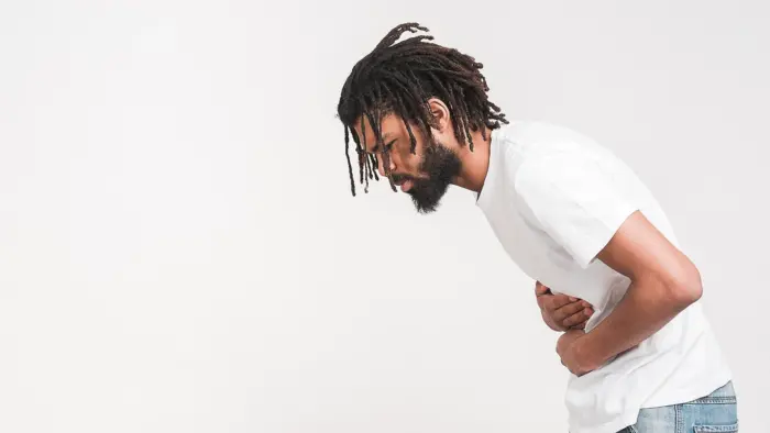 Man suffering from constipation