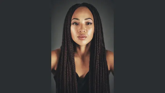 Young woman wearing braids