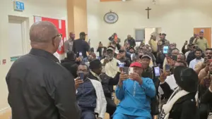 Obi addressing  Nigerians in Birmingham, United Kingdom