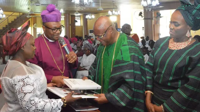 Wife of The African Church Primate, Lady Evangelist Dorcas Abbe; the Primate, His Eminence, Julius Olayinka Osayande Abbe; the founder of Southwestern University, Babatunde Adewale Odufuwa; and his wife, Chief Ibidun Adebimpe Odufuwa, during the presentation of the Bible by the Primate during Odufuwa’s 70th birthday service at The African Church Cathedral, Salem, Lagos