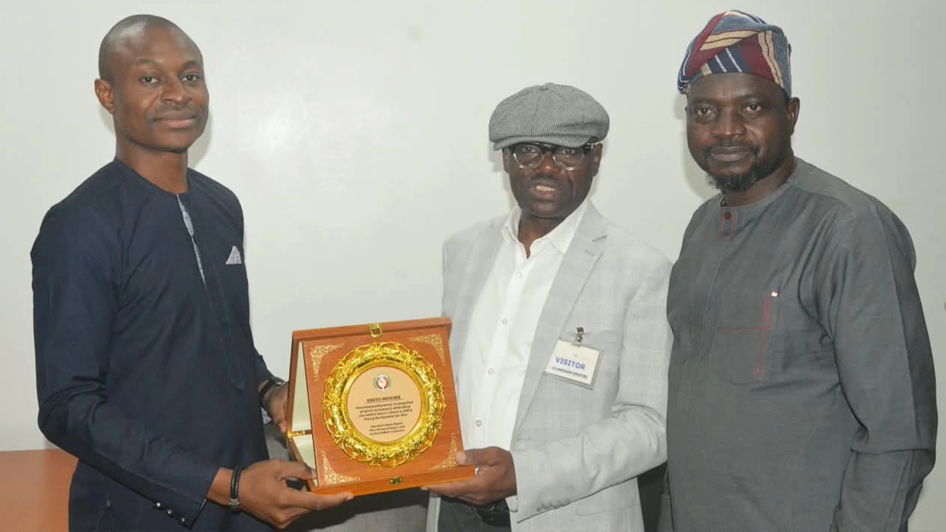 Editor, The Guardian, Dr Femi Adekoya (left); Directorate of Political Affairs at the ECOWAS Commission, Arthur Oghogho Obayuwana and Weekend Editor of The Guardian, Dr Kabir Alabi Garba, at the presentation of the posthumous award to Krees Imodibie at the corporate head office in Lagos, yesterday.                                    						       PHOTO: MARVELLOUS OBASA